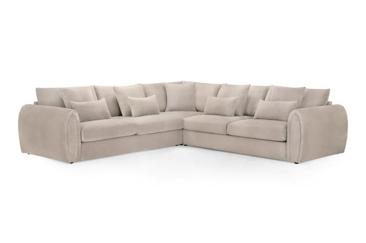 Beige sectional sofa on a white background