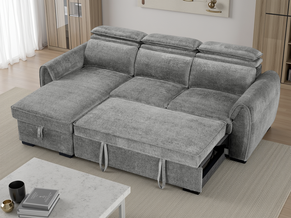 A gray fabric sectional sofa with a chaise lounge and extended footrest, shown in a modern living room setting.