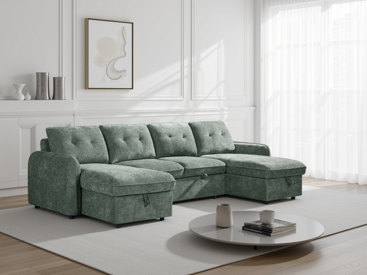 Green sectional sofa in a living room with a coffee table and decor items.
