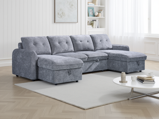 Gray sectional sofa in a living room setting with a coffee table and decor items.