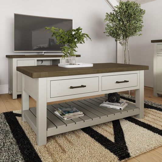 Purbeck Truffle Two-Drawer Coffee Table, centred in a modern living room.