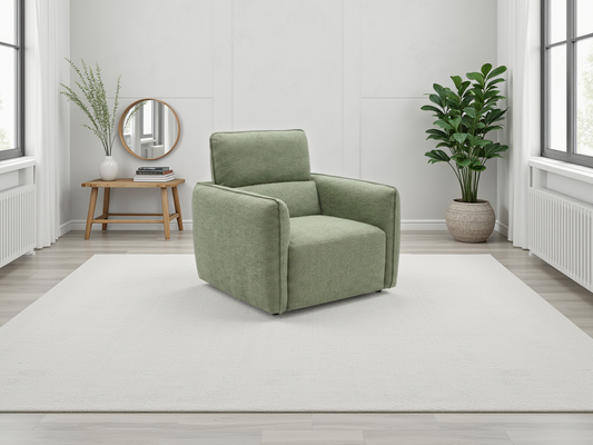 Ascot sage green fabric armchair in a warm contemporary living room