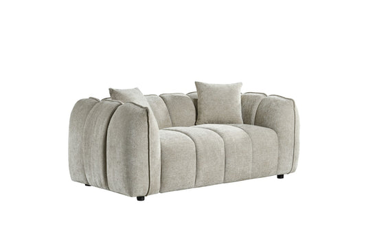 Gray sofa with cushions on a white background