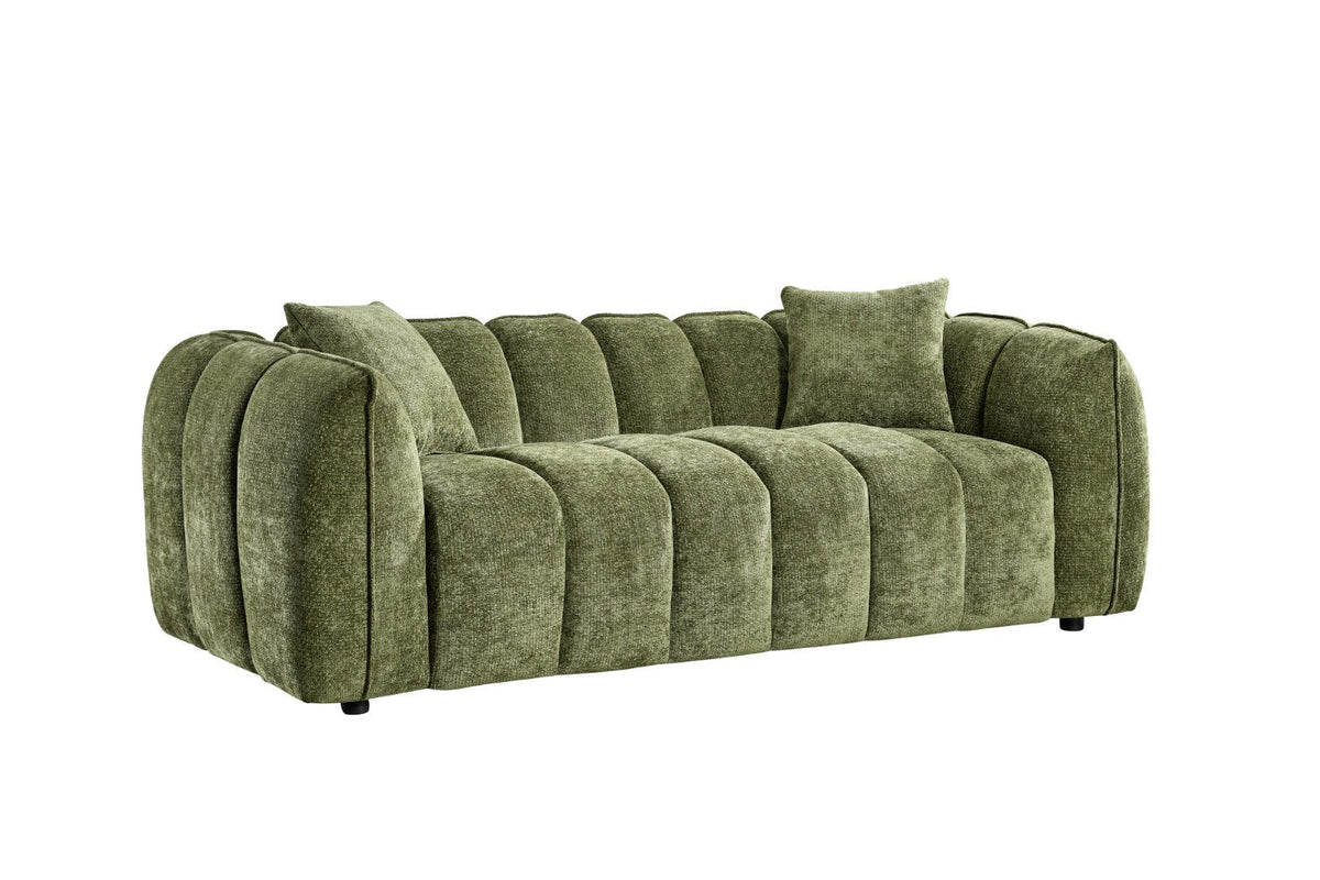 Green sofa with cushions on a white background
