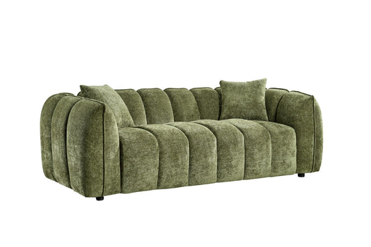 Green sofa with cushions on a white background