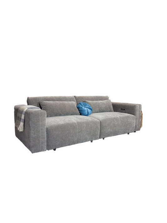 A modern beige fabric sofa on a white background 