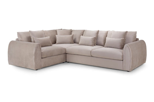 Beige sectional sofa with cushions on a white background