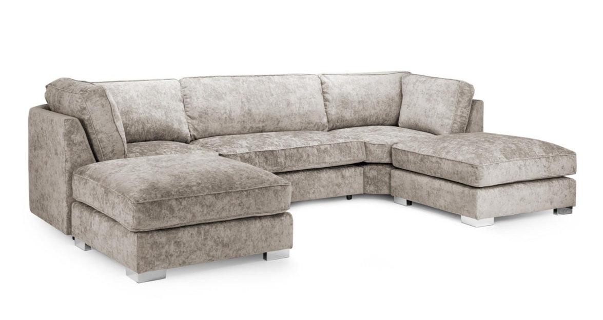 A light beige textured fabric sectional sofa with a left-facing chaise and a right-facing chaise, shown on a plain white background.