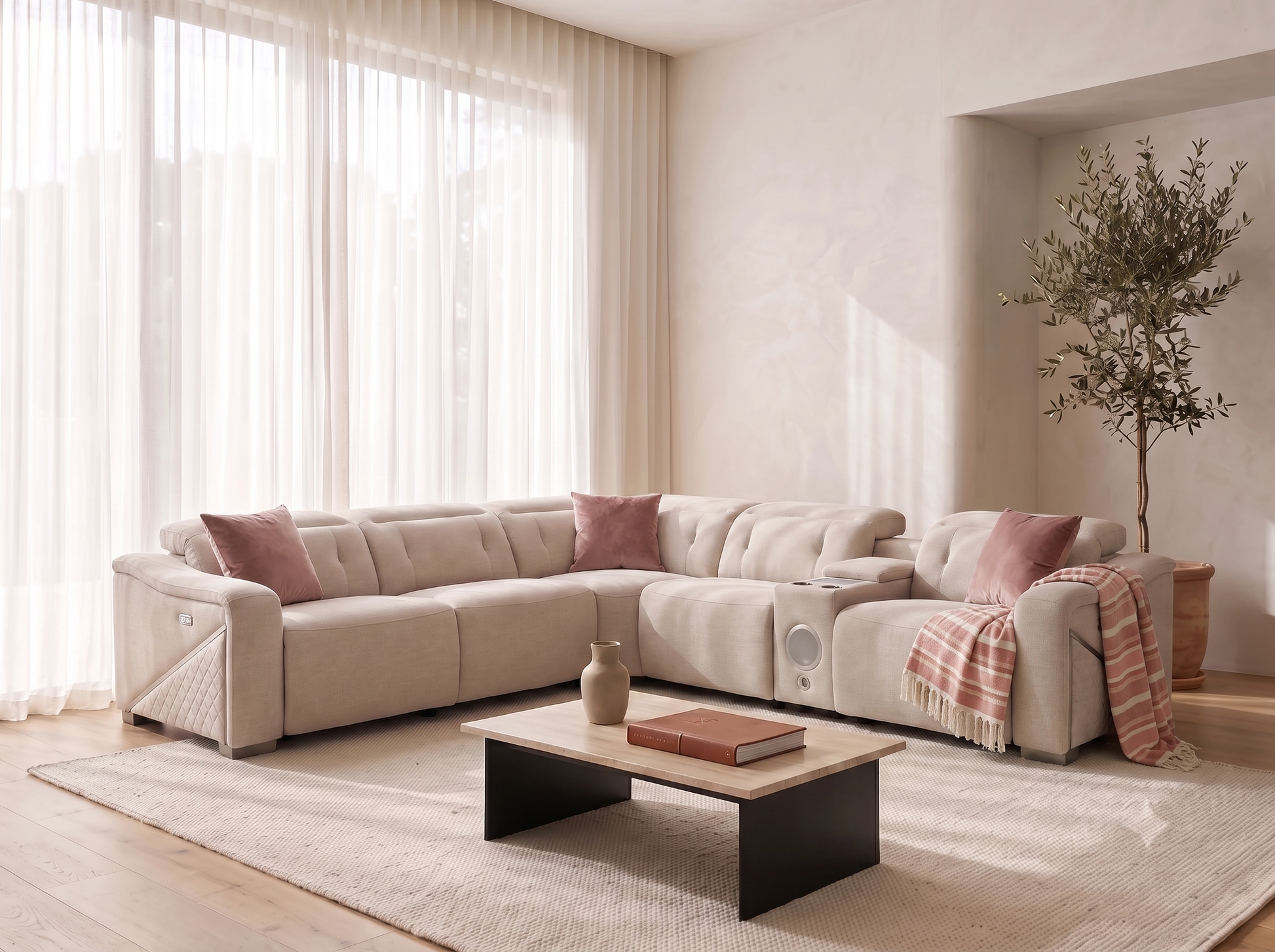 A modern beige sectional sofa styled in a bright, minimalist living room