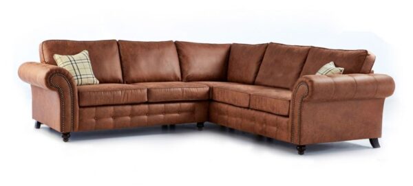 Brown leather sectional sofa on a white background