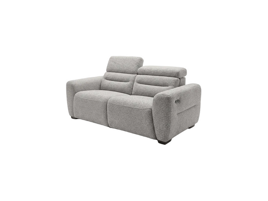 A modern two-seater reclining sofa upholstered in a textured beige bouclé fabric, shown from a three-quarter angle against a plain white background.