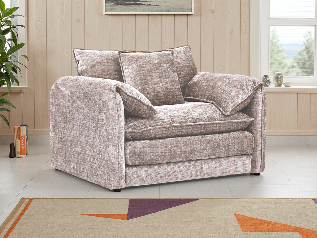 Beige sofa in a living room with a plant and window in the background