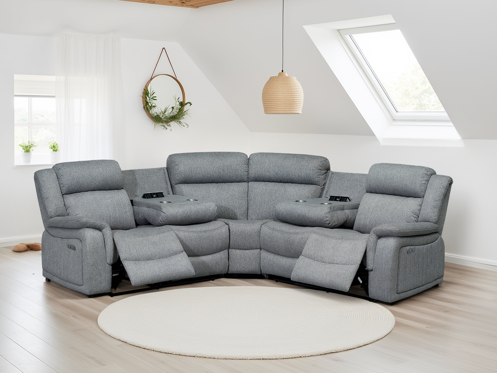 Gray sectional sofa in a modern living room with white walls and wooden floor.
